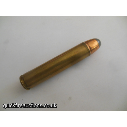 One inert 585 short Hubel express cartridge