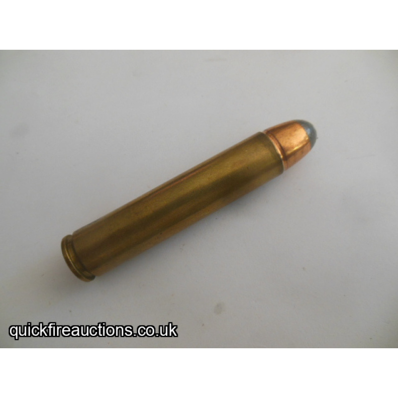 One inert 585 short Hubel express cartridge