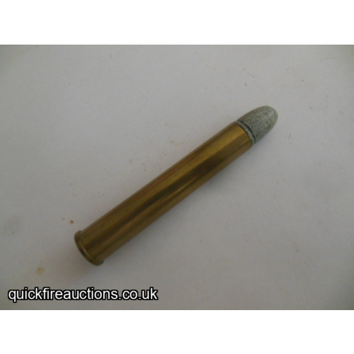 One inert 9.3 x 57R Express cartridge