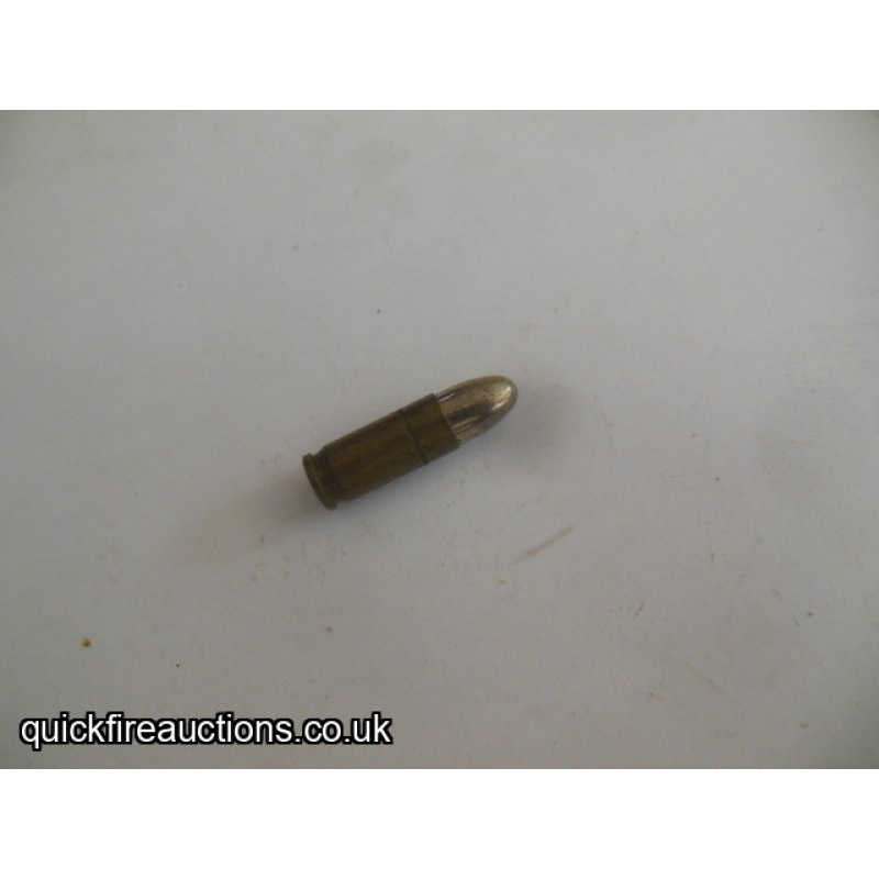 One inert 1940 French 7.65 MAS pistol cartridge