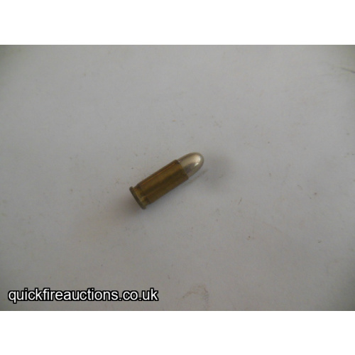 One inert Geco 6.35 cartridge