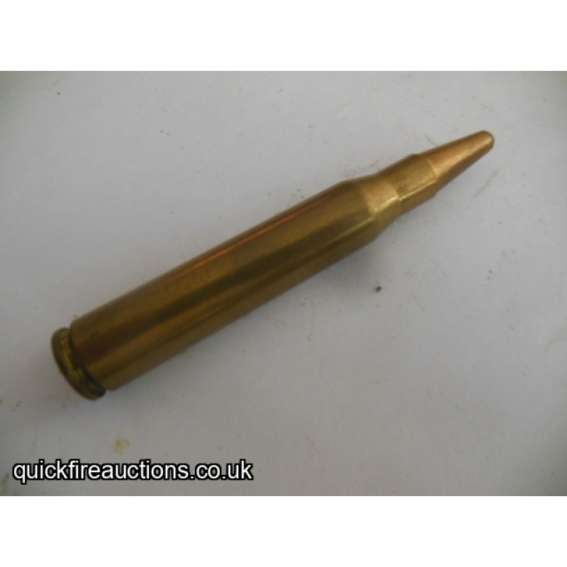 One inert Austrian 8 x 68S cartridge