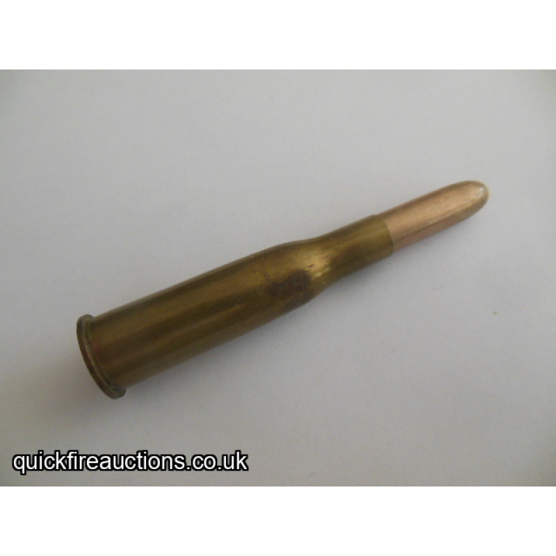One inert 1920 Portuguese 8mm Kropatschek short cartridge