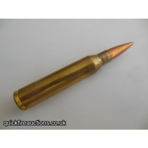 One inert Yugoslav 338 Lapua magnum sniper cartridge