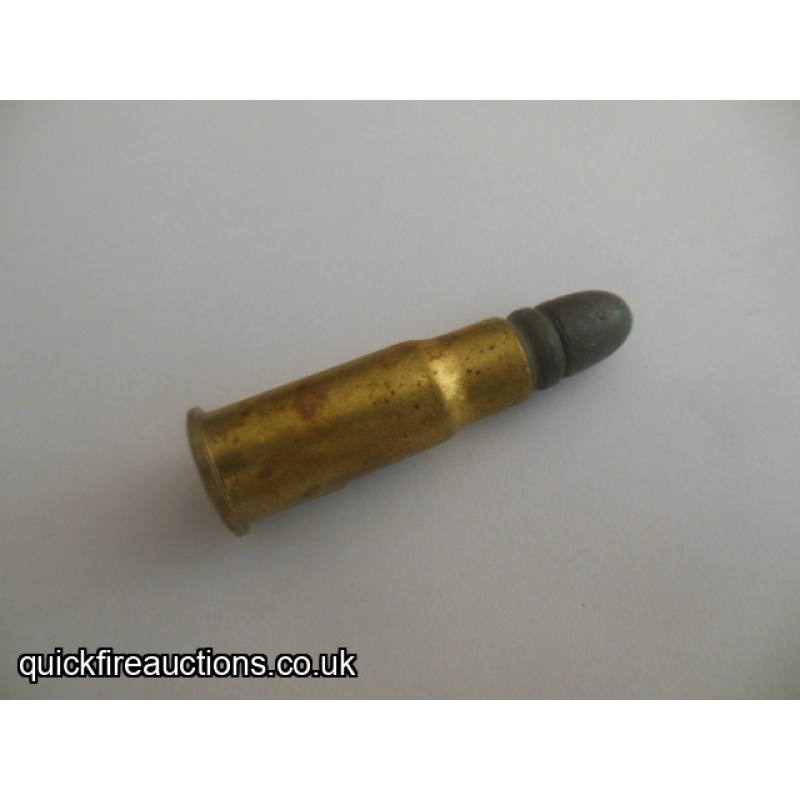 One inert HR 10.4 Vetterli Centre fire cartridge