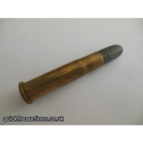 One inert 1894 11mm Spanish Remington cartridge