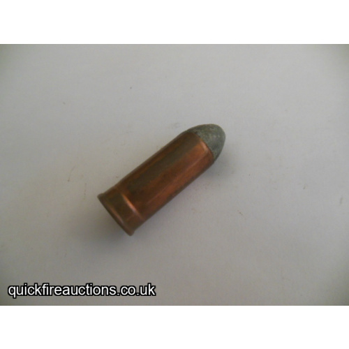 One inert 45 Colt Benet primed cartridge