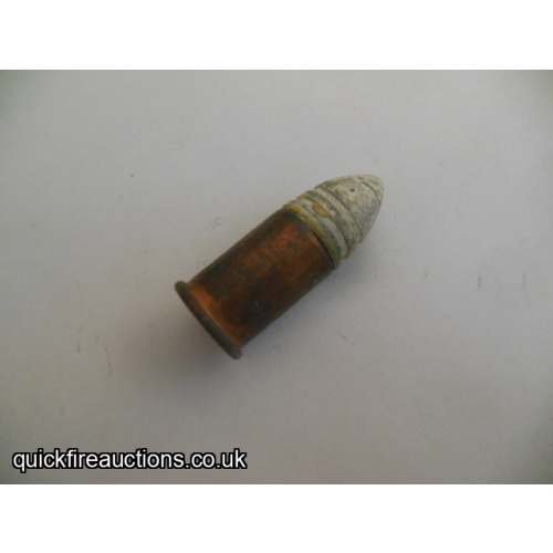 One inert  Remington 56-52 rimfire cartridge