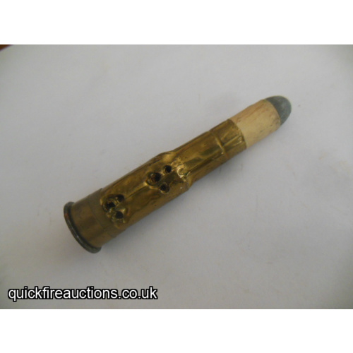 One inert 577/450 Martinin Henry rolled brass dummy/board cartridge