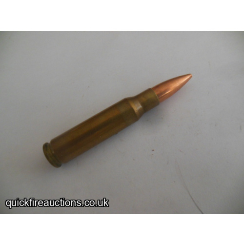 One inert 1964 Lake City 7.62 match cartridge