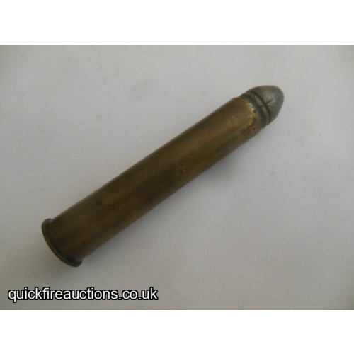 One inert Holland & Holland 577 3" cartridge
