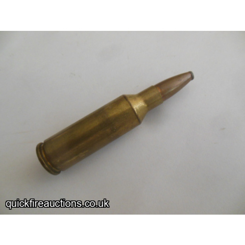 One inert Lazzeroni 7.82 Patriot cartridge
