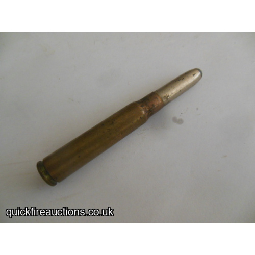 One inert Kynoch 7.9 or 8mm sporting bullet cartridge