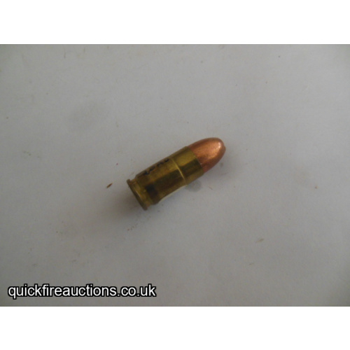 One inert RP 9mm + P cartridge