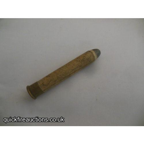 One inert Eley 360 2 1/4" card case cartridge