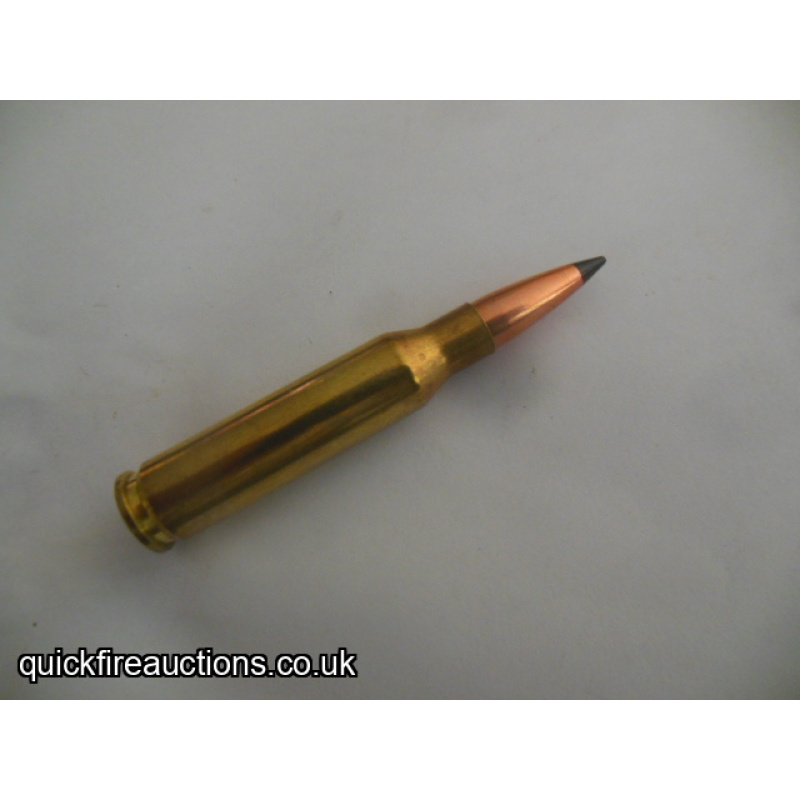 One inert R_P 7mm-08 Remington ballistic tip cartridge