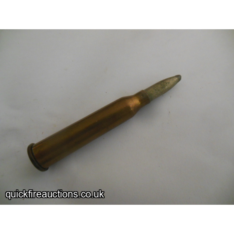 One inert 246 Purdey  cartridge