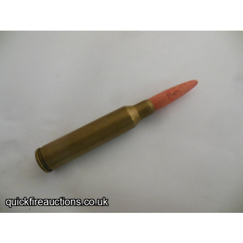 One inert 1942 Swedish 6.5mm x 55 wood blank cartridge