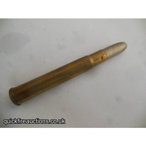 One inert Hollands 375 magnum flanged big game cartridge