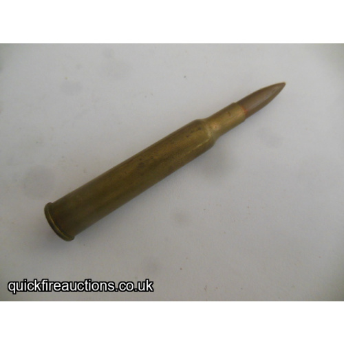 One inert Kynoch 240 magnum flanged cartridge