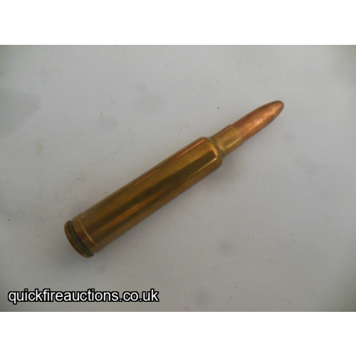 One inert Norma 7 x 61 Sharps & Hart cartridge