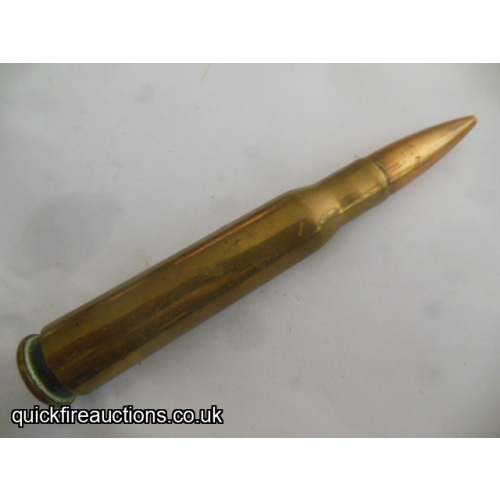 One inert 1942 St Louis 50 cal  cartridge