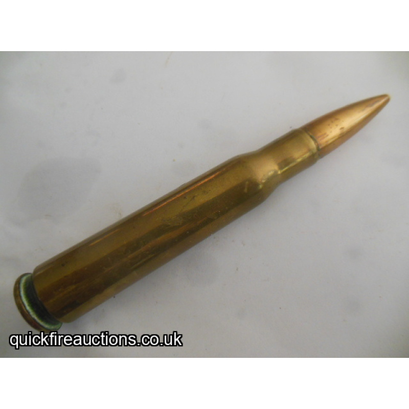 One inert 1942 St Louis 50 cal  cartridge
