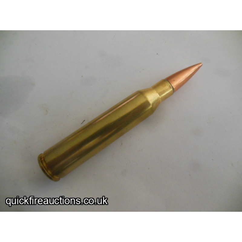 One inert Swiss 338 Lapua magnum cartridge