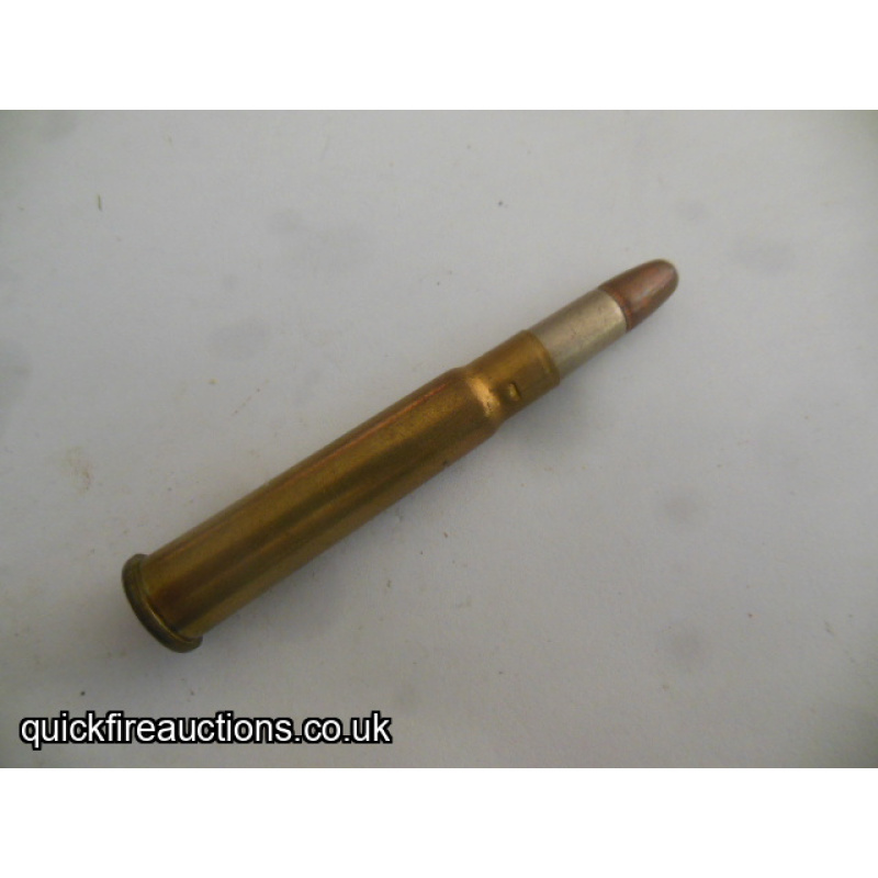 One inert Kynoch 303 Lesley Taylor bullet cartridge