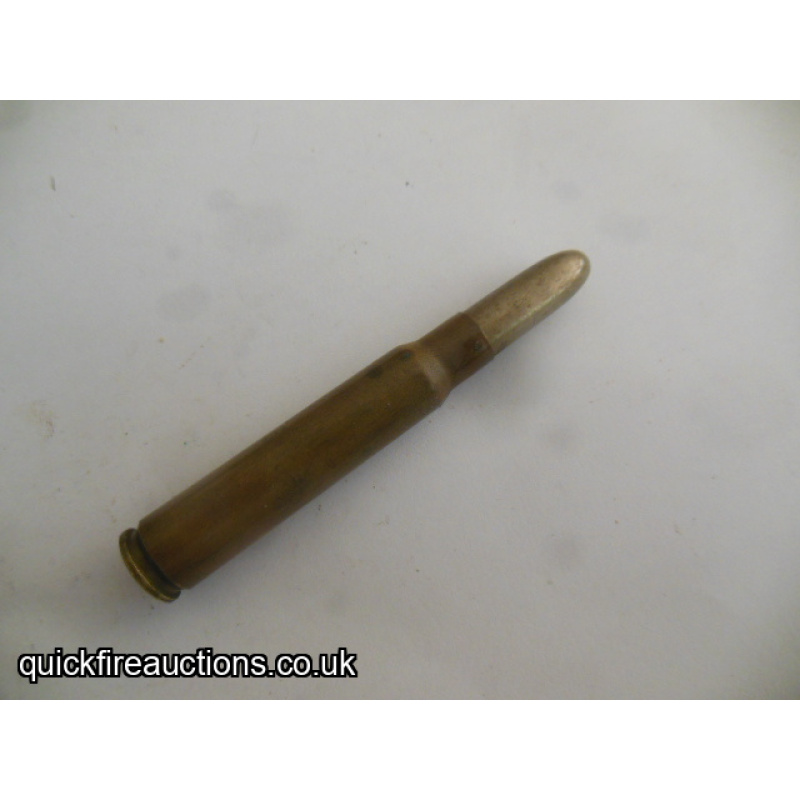 One inert 1911 German 7.92 mod 88 cartridge