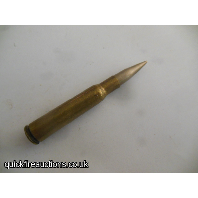 One inert Kynoch 7mm spire point bullet cartridge