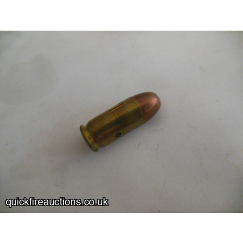One inert R-P 45 auto cartridge