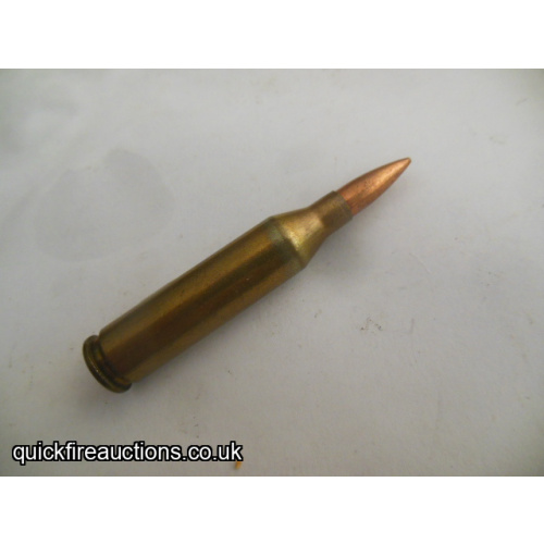 One inert 1955 Western 22 / 7.62 experimental cartridge
