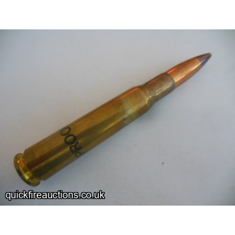 One inert Kynoch 50 cal Proof cartridge