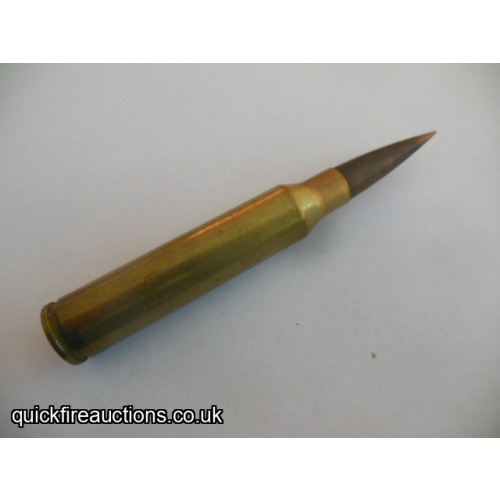 One inert Jamison 375Chey Tac sniper cartridge