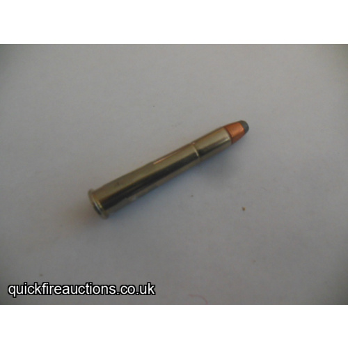 One inert John Wayne 32-40 cartridge