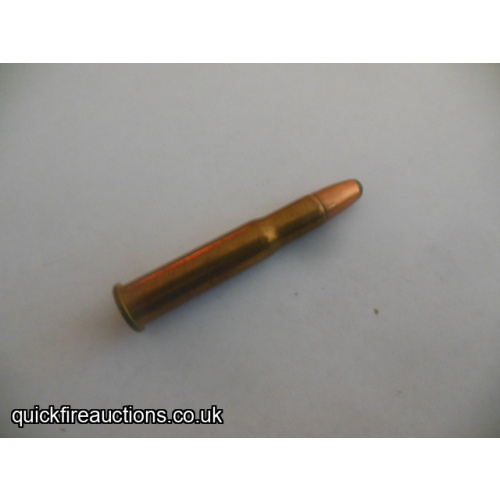One inert Dominion 32 special cartridge