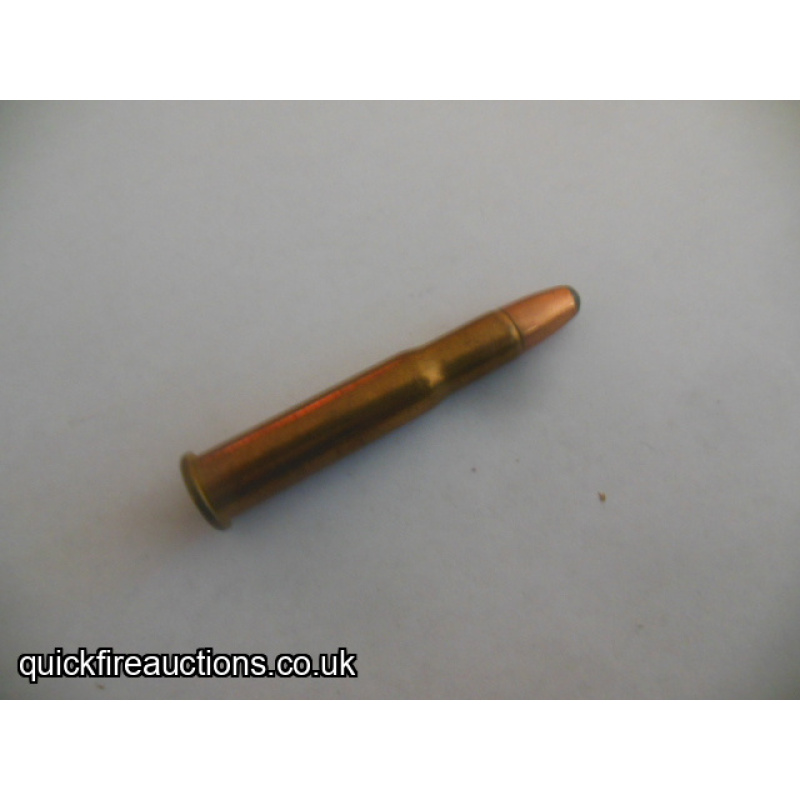 One inert Dominion 32 special cartridge
