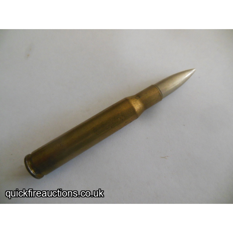 One inert 1919 USC Co 30-06 cartridge