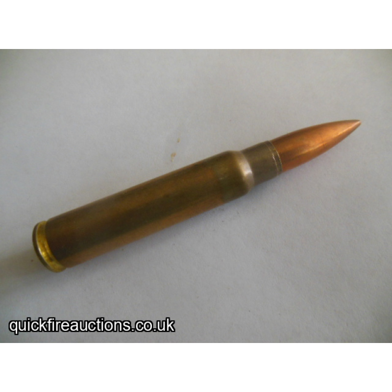 One inert 1939 FN 7.65 Mauser cartridge