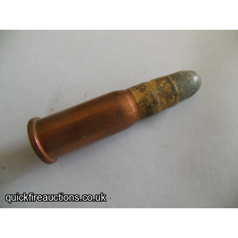 One inert Swiss 10.4 x 38R Vetterlie rimfire cartridge