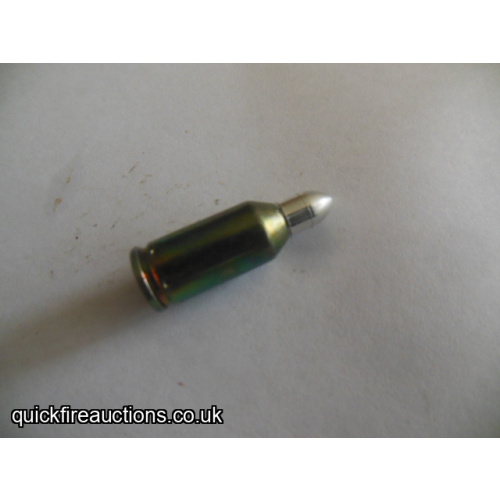 One inert UTM 9mm training cartridge