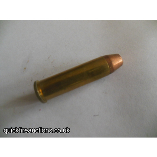 One inert Yugoslav 357 magnum revolver cartridge