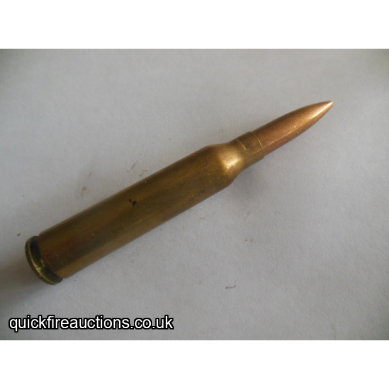 One inert Gibbs 256 magnum cartridge