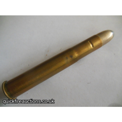 One inert Eley 500-465 3 1/4" big game cartridge