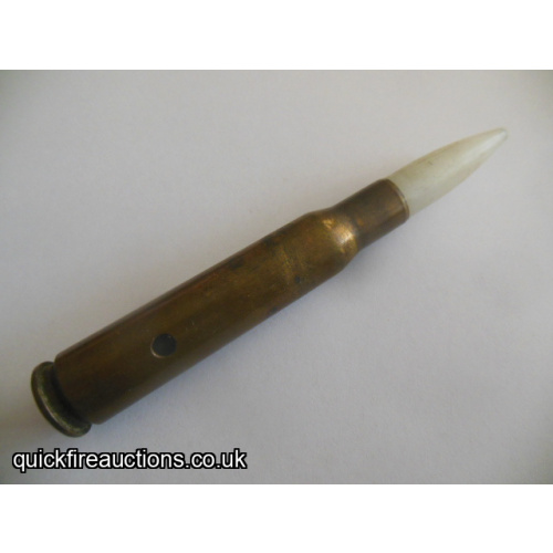 One inert 1952 Twin Cities 50 cal drill/dummy cartridge