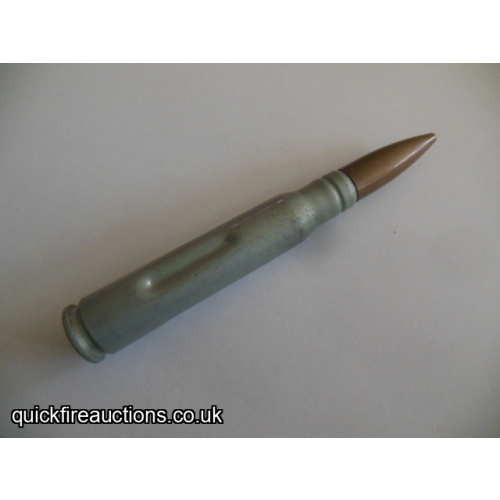 One inert 1976 Kynoch L1A1 50 cal drill/dummy cartridge