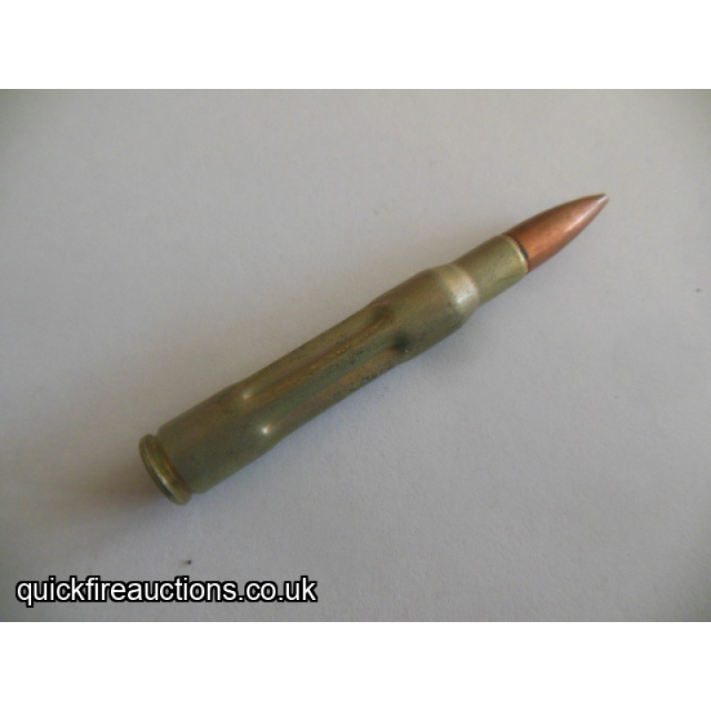 One inert 1940 Frankford Arsenal 30 cal drill/dummy cartridge